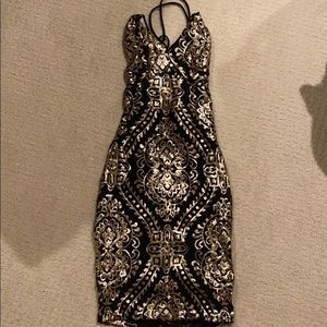 Gold and black sequin dress